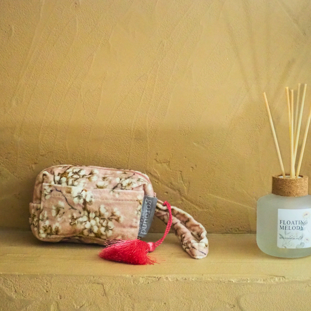 make-up tasje roze met bloemprint