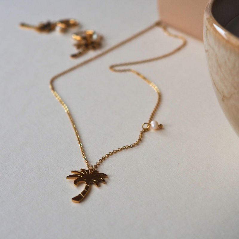Palmboom ketting goud, close-up