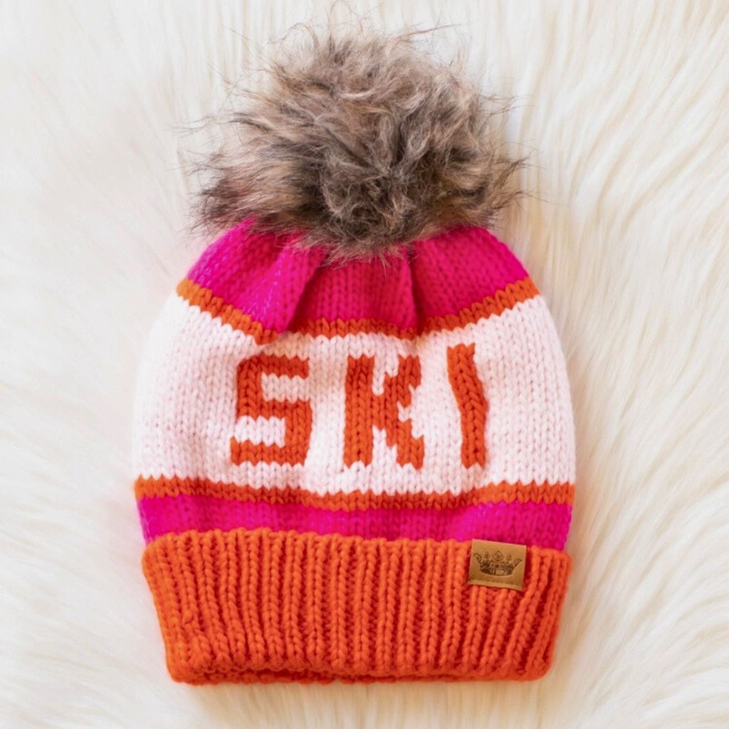 Skimuts roze met rood en pompon
